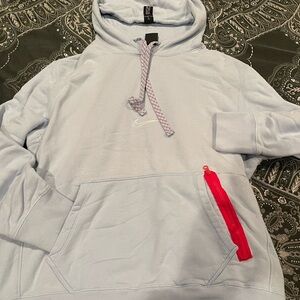 Nike Men's Light Blue Hoodie with Red Accent